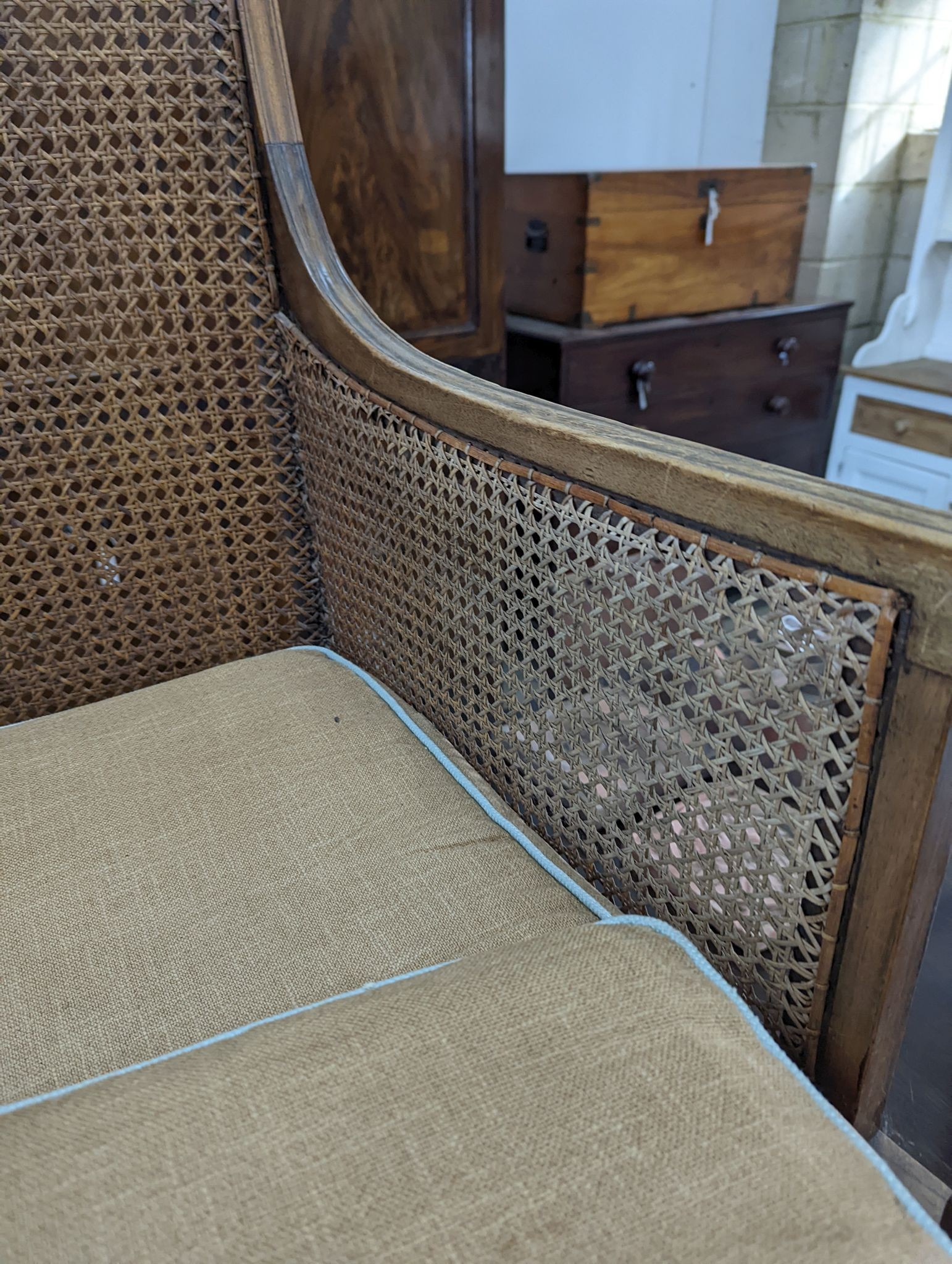 A Regency style mahogany bergere armchair, width 59cm, depth 56cm, height 97cm